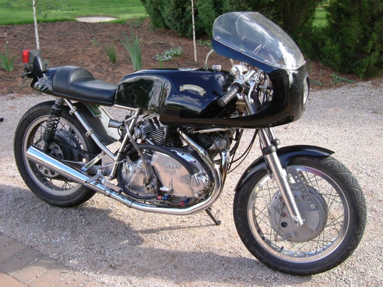 An early Terry Prince Vincent as she has conventional shocks rather than the subsequent cantilever. This bike resides currently in Australia and is maintained by the local Vincent workshop Ken Phelps. Ken has assembled numerous Norvin too.