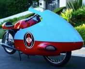 1957 Gilera 125 Road race. This fairing provided typically about 20 mph additional top speed on the smaller displacement with significant drawback in case of lateral wind which led to crashes and a ban from the FIM for road racing.