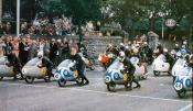 This is how looked a 125 cc Grand Prix grid in 1957: Front row, Luilike a 125ccgi Taveri (blue helmet), Carlo Ubiali (6), Sammy Miller (4), Cecil Sandford (29) and Tarquinio Provini (44); Second row, Arthur Whealler (36)