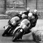 1.Four Aces in a bend: Mike Hailwood leading the way (9), Giacomo Agostini (2), Renzo Pasolini just behind Hailwood and Phil Read.