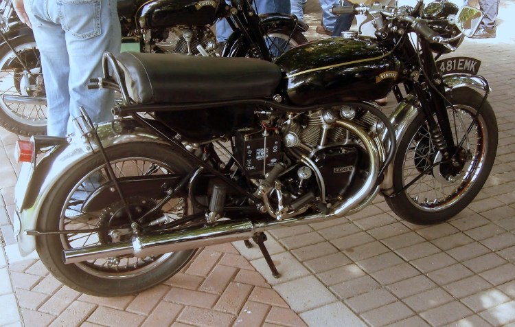 D The Series D moved further Vincent’s vision of the Grand Tourism motorcycles. The frame was completely redesigned due to the addition of the fiberglass body panels and the seat became suspended. The engine casting were die-cast opposed to sand-cast, at the cost of a significant investment which would have been justified for larger production volume. A central stand maneuverable by hand is added and a battery-coils ignition combo replaced the magneto. As the design intended to be exclusively enclosed, the undressed Rapide and Black Shadow shape do not convey anymore this filling that the bike was built seamlessly around the engine, but the comfort improvements were significant. Two new models were introduced, the enclosed Black Knight and the Black Prince. The production includes 147 Rapide, 140 Black Shadow, 78 Black Knight, 108 Black Prince, 1 Black Lightning, 3 Comet and 2 Victor. This is the 1000 Rapide Series D