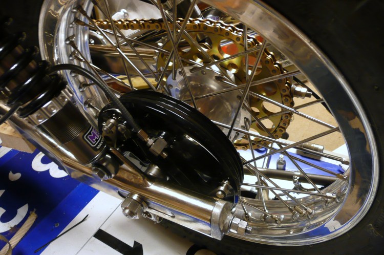 The rear wheel with a Black Lightning brake. The hub is custom made and so is the sprocket