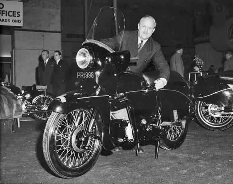 P As Philip Conrad Vincent (1908-1979), known by enthusiasts as PCV. He bought H.R.D. from Howard R. Davies in 1928 for £450 and established the Vincent HRD Co., Ltd. The logo was changed, adding “The Vincent” in very small letters over the top of the bold HRD and new models were introduced. PCV is here with PRI 998, the road test Black Prince.