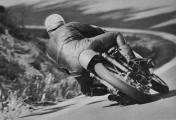 7. One of the most famous picture of Mike Hailwood, on the RC166, the Honda 250 cc 6 cylinders.