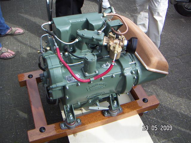 This is lifeboat engine: “a 500 cc 3 cylinder 2 stroke, 2 outer cylinders being the power cylinders, the middle being scavenging cylinder, Each power cylinder contained two slightly oversquare opposed pistons with uniflow piston-porting. Unusually for a small two-stroke, there was no reliance on the Kadenacy effect. The transfer ports though were angle-drilled to encourage swirl. Even more unusual the scavenge piston was double acting” says the comment coming along with the picture....  …. Really? Sometimes I wish that Vincent engineers were more focus on motorcycles.