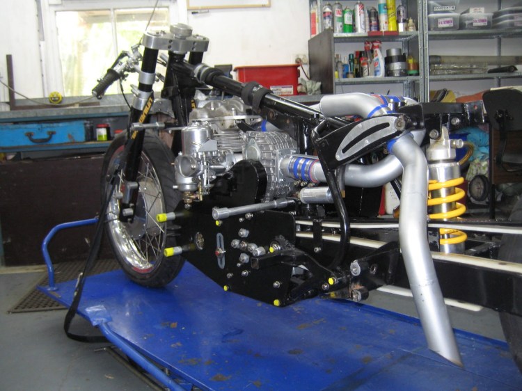 The supercharged record breaker Velocette in late 2012. We can see the supercharger, its drive and enormous SU carb, as well as the monoshock rear suspension and massive front fork assembly. | Picture Stuart Hooper