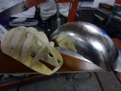 The pattern and the upper tank. Some craftsmen use a styrofoam form instead.