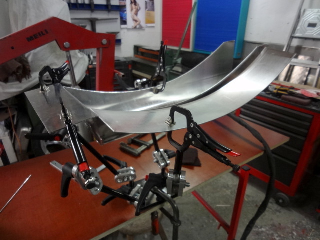 All these subcomponents are positioned with jigs and welded together.