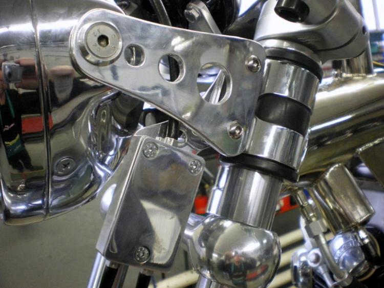 The Headlamp brackets and the front brake equalizer (left | right)