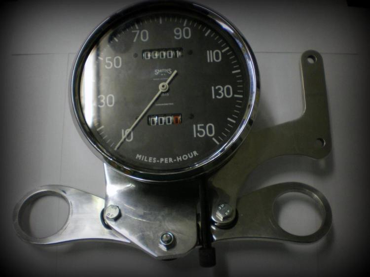 The Shadow clock bracket and on the right side where the rev-counter attachment holes.