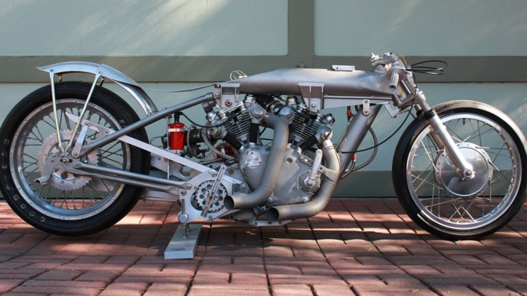 The upper spine holds the nitro-methane while the vertical one in front of the engine holds the oil. The Nitro double the horse power than the engine is capable to deliver with regular fuel. The frame is all made of aluminum.
