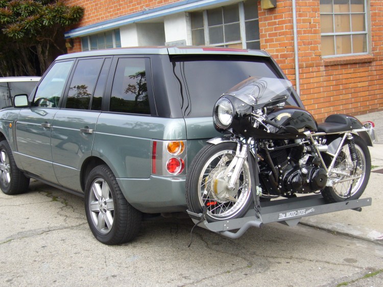 The Egli-Vincent is compact and light, however this is quite a bold way to transport it...